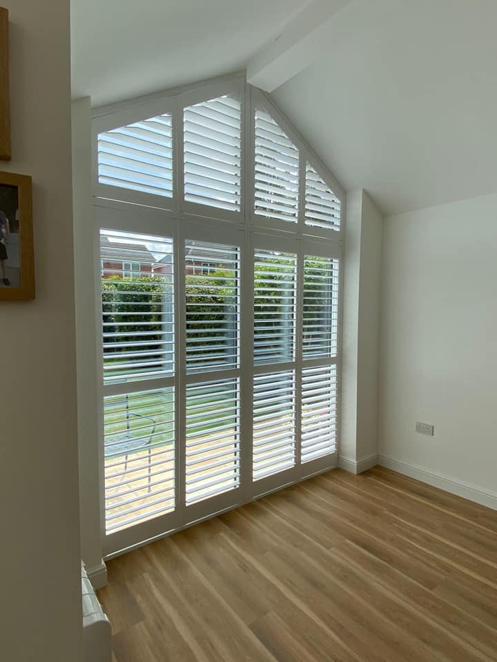 shutters in a large window