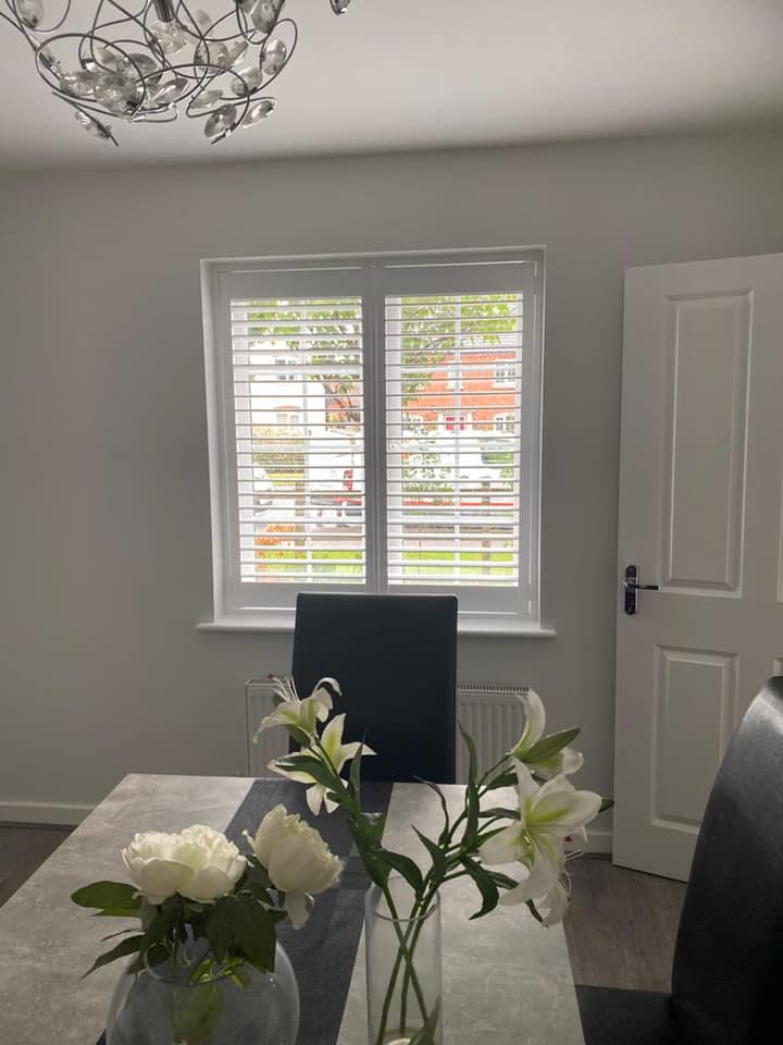 white shutter in dining room