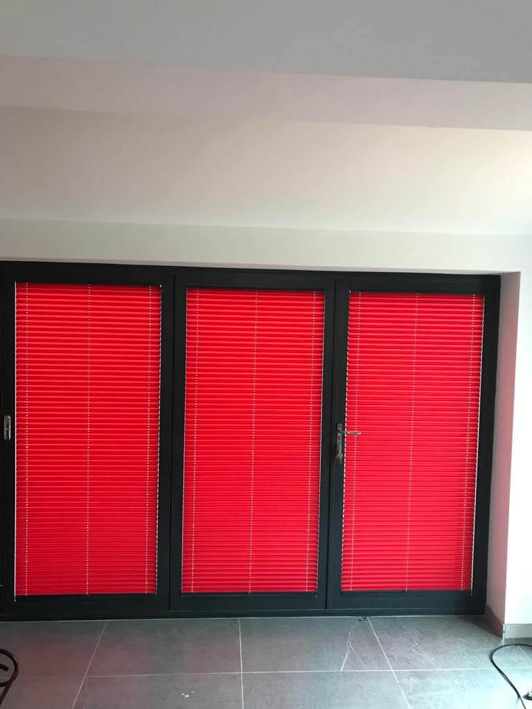 Red tilt and turn window blinds
