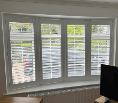 white bay window shutters