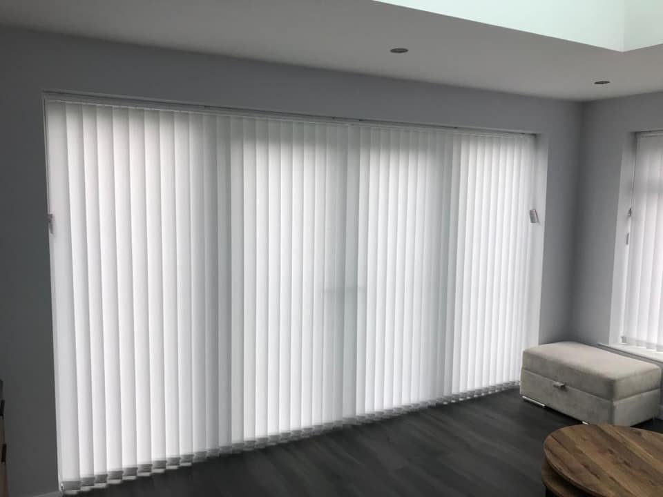 white vertical blinds