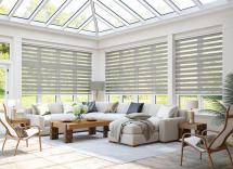Grey vision blinds in conservatory